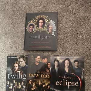 The Twilight Saga Film Archive MINT condition. With The Movie Guides.